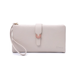 Close-up of beige lychee leather wallet with rose gold horseshoe buckle and wristlet