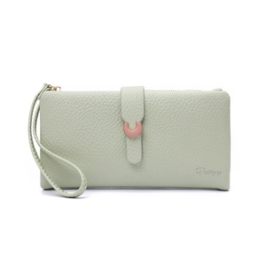 Detail of light green long wallet with lychee texture, gold buckle and wrist strap