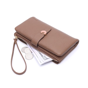 Brown long wallet in pebbled leather with snap closure and wristlet strap for women