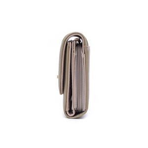 Side view of multi-layered grey-green faux leather wallet with zipper pocket and card slots