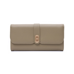 Detailed close-up of khaki pebbled leather texture and gold buckle on a long wallet
