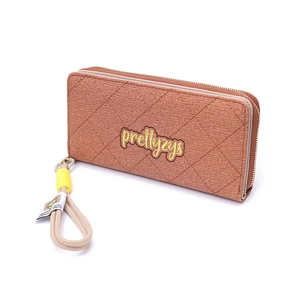 Detailed close-up of terracotta woven texture and embroidery on long zipper wallet
