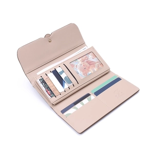 Inside view of women's long wallet showing multi-card slots and transparent photo window