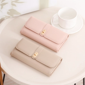 Detail of lychee pattern PU leather wallets with Forever Young gold rotating metal clasps