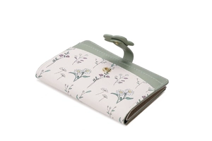 Close-up of floral buckle and daisy print on sage green short leather wallet