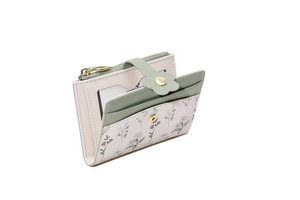 Detail view of the green floral card holder with multiple slots and a clear ID window
