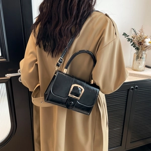Classic black patent leather handbag with gold horseshoe buckle and top handle bag for women