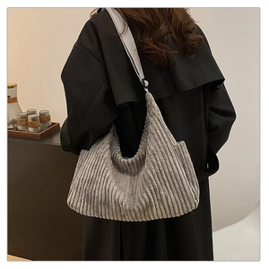 Minimalist grey corduroy hobo bag for women with large capacity and adjustable strap