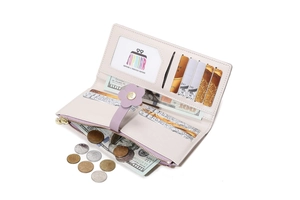 Detailed interior of long pink wallet showing multiple card slots and flower clasp