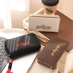 Detailed view of quilted PU leather wallets with zipper and wristlets in three colors