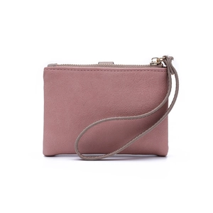Close-up of pink PU leather wallet featuring a top metal zipper and matching wrist strap