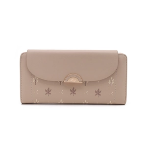 Close-up of the delicate pink leaf print texture and golden hardware on the women's wallet