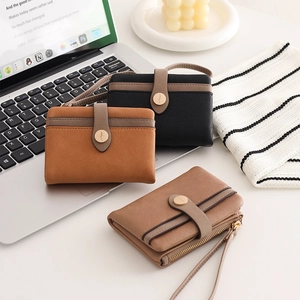 Detail of multi-functional PU leather wallet with metal buckle and wrist strap