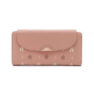 Detailed view of women's tri-fold wallet with pink leaf print and gold metal clasp