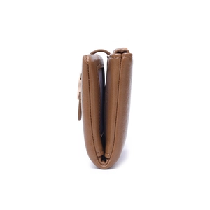 Detail view of the brown PU leather wallet showing compact tri-fold design and side buckle