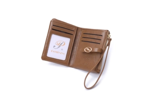 Detail view of brown PU leather wallet featuring card slots, ID window, and zipper pocket