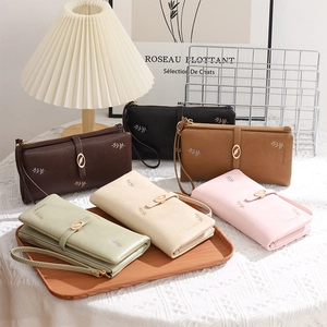 Portefeuilles longs en cuir PU pour femmes avec broderie de feuilles et dragonne en six couleurs