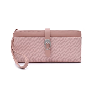 Detail of pink long wallet showing textured faux leather patterns and silver metal buckle