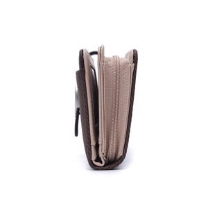 Side view of multi-compartment women's wallet in brown and beige pebbled leather