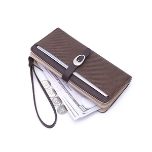 Brown long striped wallet for women with leather trim and silver metal buckle