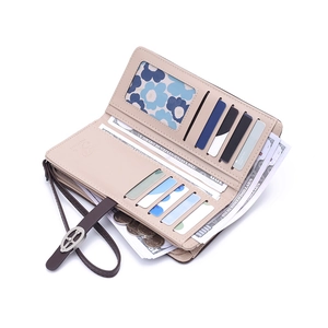 Elegant beige long leather wallet for women with multi-card slots and a wristlet strap