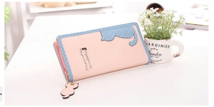 Detail of pink and blue PU leather wallet featuring a cat silhouette and cat-shaped zipper