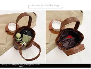 Detail view of the brown leather tote bag interior showing spacious storage compartments