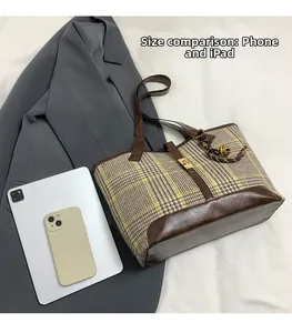 Checkered tote bag size comparison with tablet and phone showing large capacity