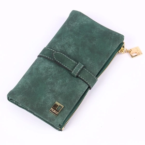 Detail of dark green matte wallet showing gold FRIEND logo and metal zipper closure
