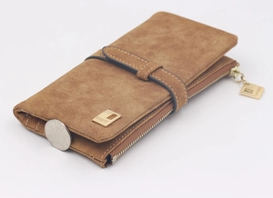 Detailed side view of brown matte long wallet featuring a gold logo plate and metal zipper