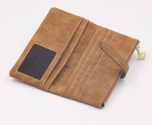 Detailed view of the brown frosted long wallet interior with card slots and zipper pocket