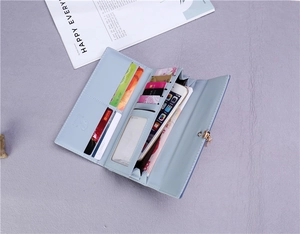 Internal view of light blue tri-fold PU leather wallet with multiple card slots and photo window