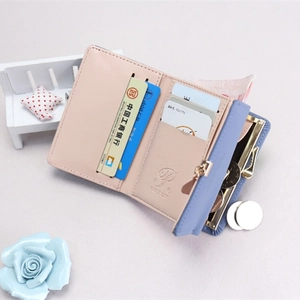Short bifold women's wallet in Morandi blue and pink with metal clasp coin pocket