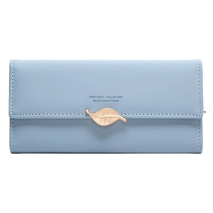Close-up of light blue long wallet with golden leaf pendant and engraved lettering