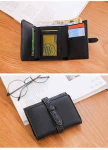 Detailed interior of black litchi grain leather tri-fold wallet with card slots and cash pocket