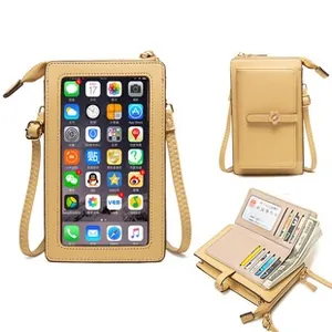 Macro view of beige crossbody wallet showing transparent phone window and card slots