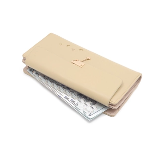 Long beige bifold wallet for women featuring golden heart pendant and multi-card slots