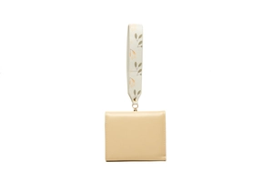 Detail of cream PU leather wallet with floral wristlet strap and gold metal hardware