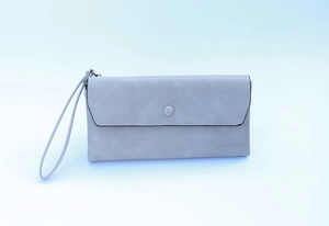 Detail of grey matte long wallet with wristlet strap and button closure design