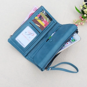 Internal view of blue faux leather wallet featuring card slots and a phone compartment