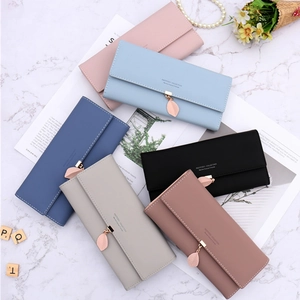 Minimalist long PU leather tri-fold wallet for women with elegant metal leaf pendant