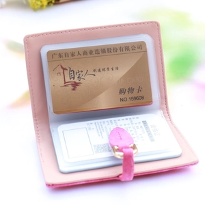 Pink vintage matte leather folding card holder with leaf buckle and clear slots