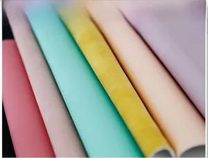 Detailed view of high-quality synthetic leather materials in various pastel colors