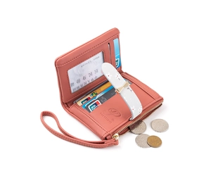 Detail view of pink multi-functional wallet with card slots and zipper coin pocket