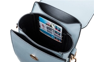 Detail view of light blue PU leather phone bag with three card slots and inner lining