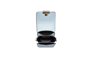 Interior detail of light blue PU mobile phone bag with card slots and magnetic closure