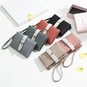 Women's minimalist litchi leather wallets in six colors with floral straps and metal bows
