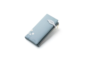 Detail of grey-blue long wallet with daisy print and leaf-shaped decorative buckle