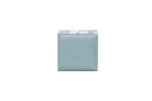 Detailed view of light blue PU leather wallet featuring white floral pattern and stitching