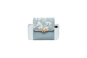 Floral print tri-fold PU wallet in Morandi green shown next to a smartphone for scale